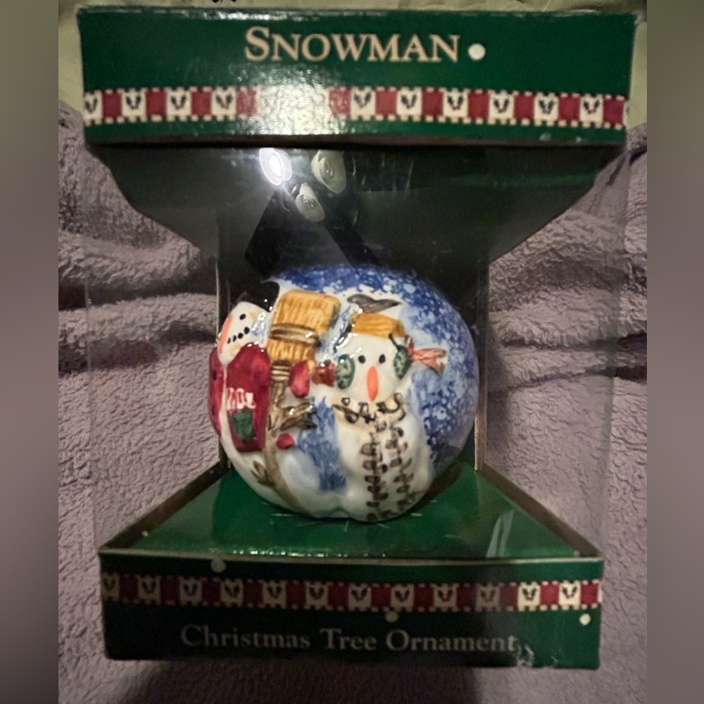 Christmas ornament by Debbie Mumm. 3 snowmen design hand painted earthenware.